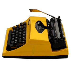 Triumph Contessa Deluxe Portable Typewriter in Yellow