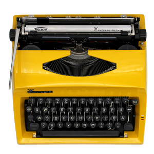 Triumph Contessa Deluxe Portable Typewriter in Yellow